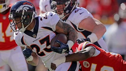 Devontae Booker races away from the defense for 26 yards