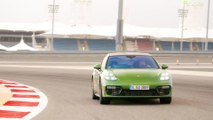 Porsche Panamera GTS Sport Turismo Driving on the track in Mamba Green Metallic