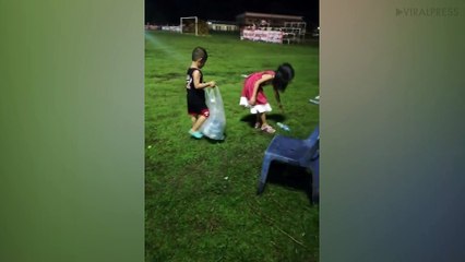 Kind-Hearted Kids Collect Plastic Bottles After Football Game