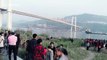 2 dead after bus plunges into Yangtze River from bridge