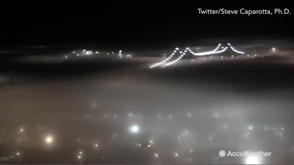 Breathtaking timelapse shows fog rolling over city