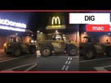 Thirsty teen stopped off at a Mcdonald’s drive-thru in a JCB | SWNS TV