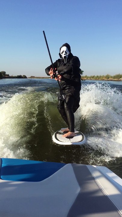 Boat Surfing Grim Reaper