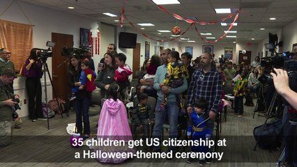 35 children get their US citizenship in Halloween costumes
