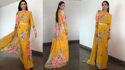 Karisma Kapoor looks graceful in yellow georgette sari designed by Sabyasachi | Boldsky