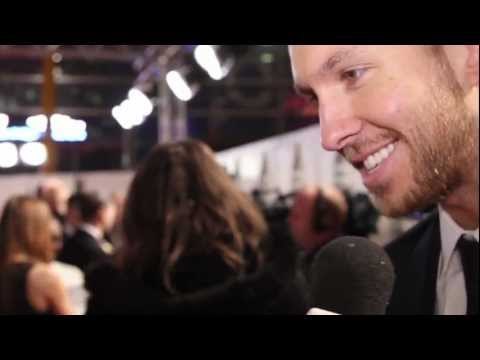 A newly LA-i-fied Calvin Harris talks to heat at the Brit Awards 2013