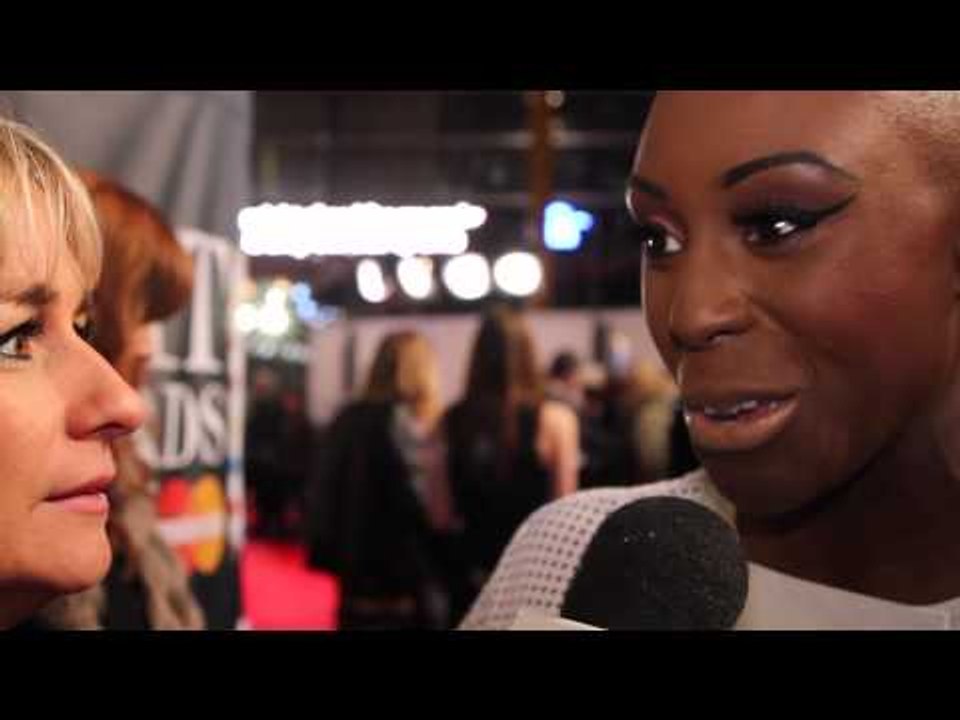 Laura Mvula talks to heat on the Brit Awards 2013 red carpet