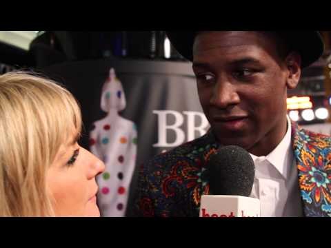 Labrinth talks to heat at the Brit Awards 2013, while wearing quite the jacket