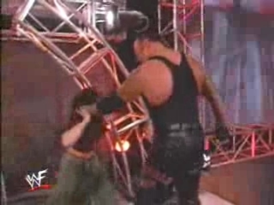 undertaker destroys jeff hardy and lita