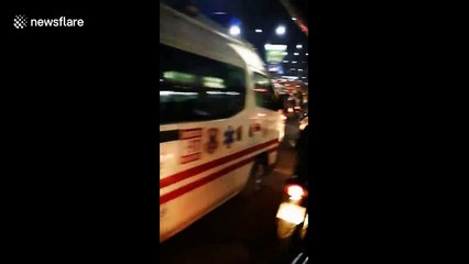 Shocking moment motorcyclists block ambulance rushing injured woman to hospital
