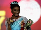 Simone Biles Becomes First Woman to Win Four All-Around World Titles