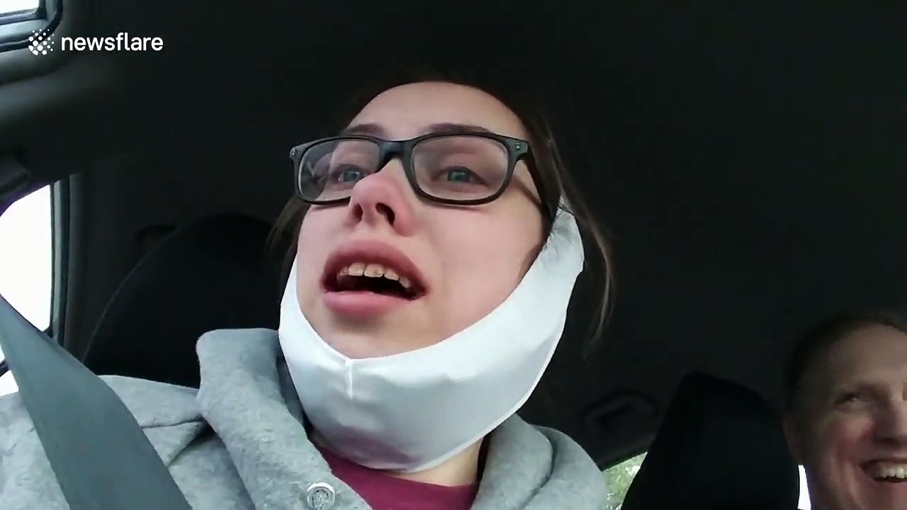 Girl ecstatic at seeing dog after wisdom tooth operation