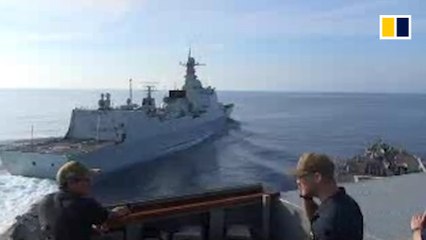 Video of near collision between US and Chinese warships
