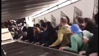 People Quickly Escalating From An Escalator