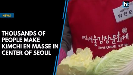 Thousands of people make kimchi en masse in center of Seoul