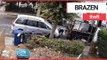 Brazen thieves caught stealing parked car by towing it away in broad daylight | SWNS TV