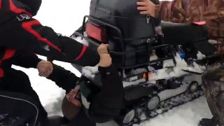 Man Stuck Inside A Snowmobile