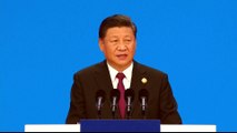 China's Xi pledges to lower tariffs, open market access