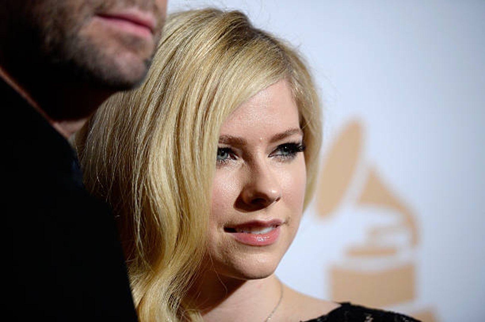 Avril Lavigne responds to rumours she died and was replaced by body double  named Melissa, The Independent