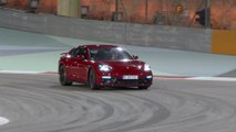 Porsche Panamera GTS in Carmine Red Night driving on the track