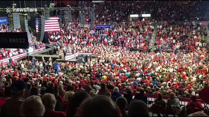 Trump pauses speech, crowd sings Amazing Grace during rally as elderly woman receives medical help