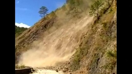 Watch: Trapped bus passenger films landslide in Philippines