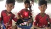 Young souvenir seller shows off linguistic skills