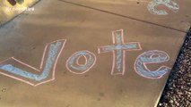 Streets of Arizona college town colorfully chalked up with reminders to vote on Election Day