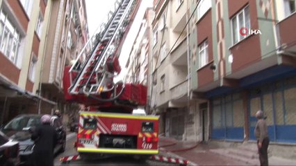 Rahatlığıyla pes dedirtti... Yangında insanlar can, o çamaşır telaşında