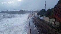 Incredible footage of a storm hitting train tracks in Dawlish