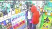 Armed teenagers robbing a store in Africa