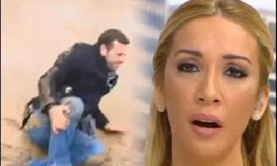Canlı yayında kapının üzerinden atlamaya çalışan muhabir kendini yerde buldu