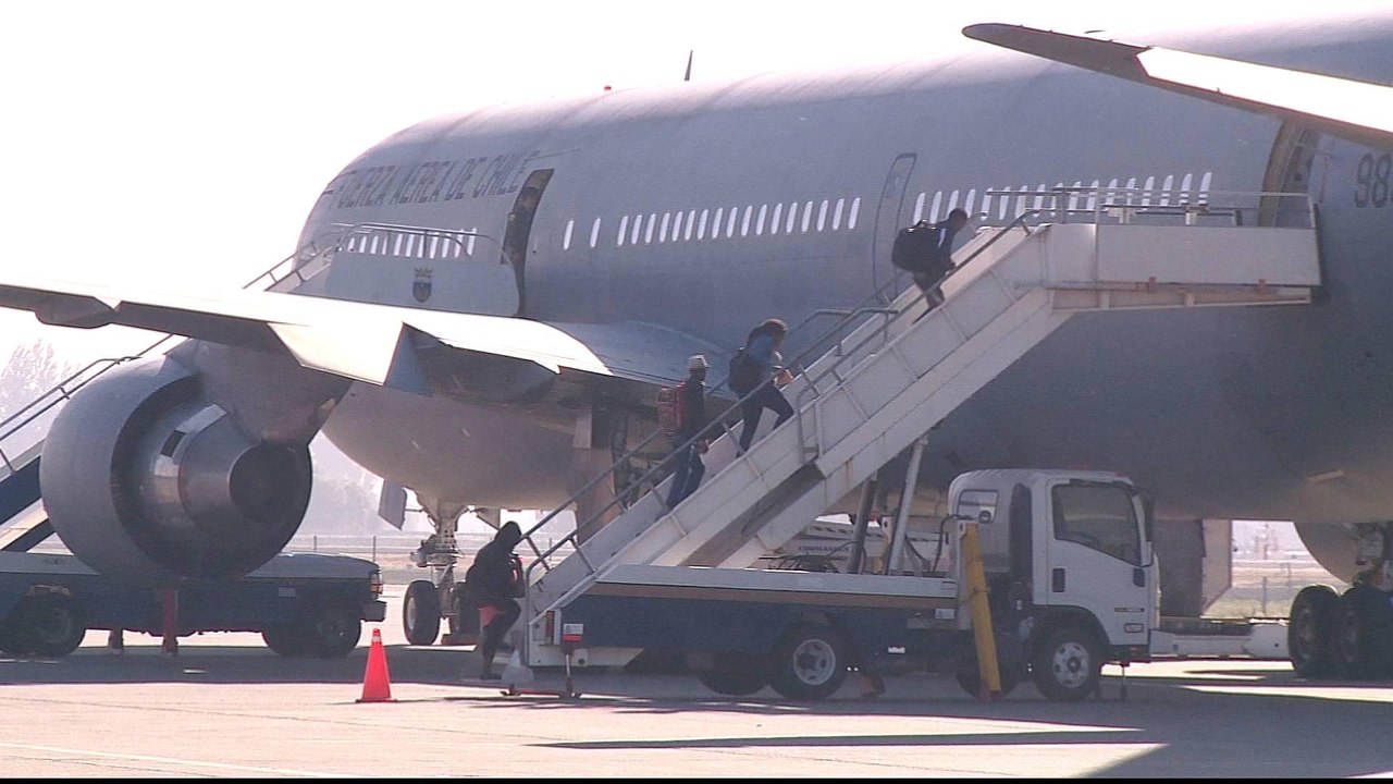 Why is Chile flying migrants back home?