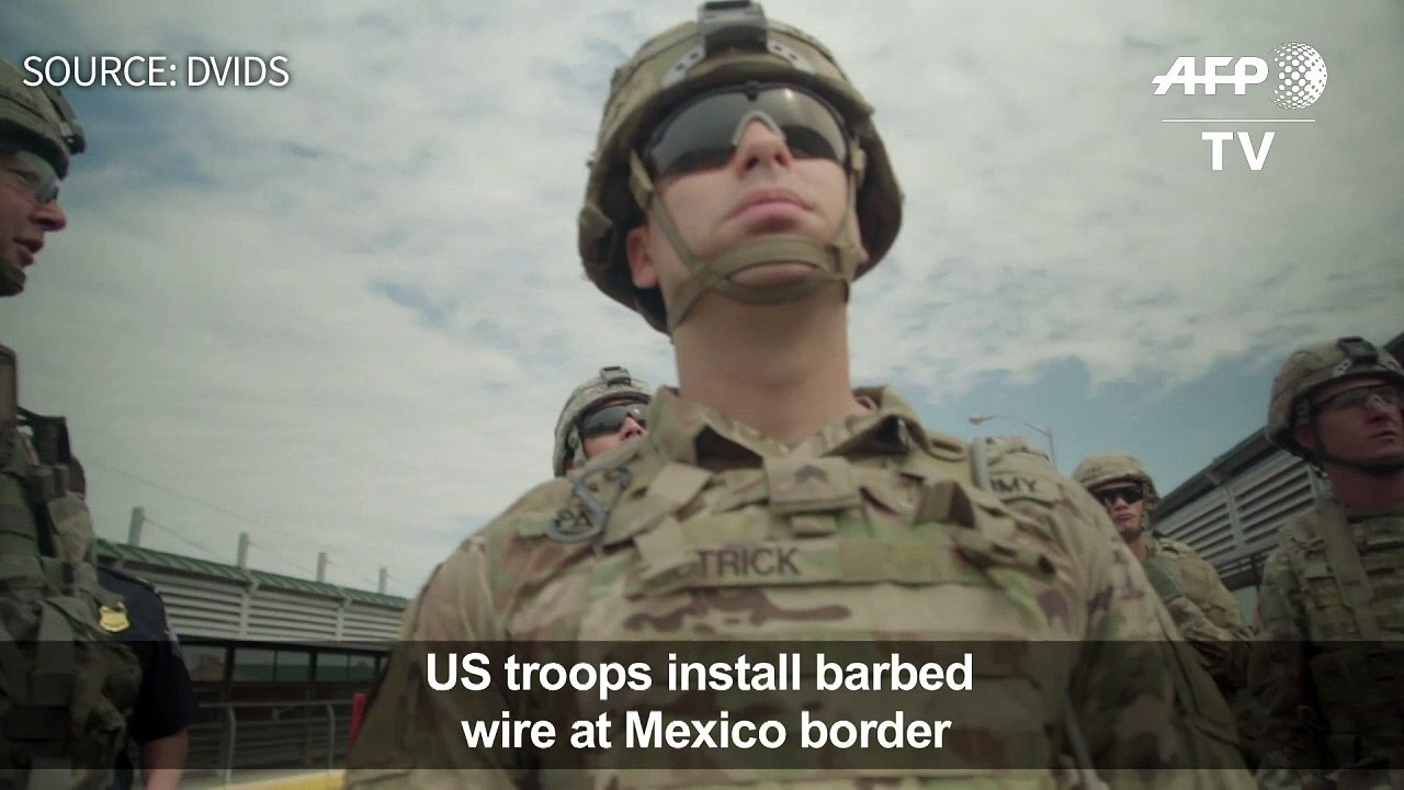 US troops install barbed wire at Mexico border