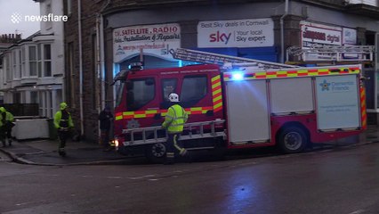 UK wave watcher gets drenched by mountain of white water