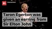 Taron Egerton Gets Jewelry From Elton John