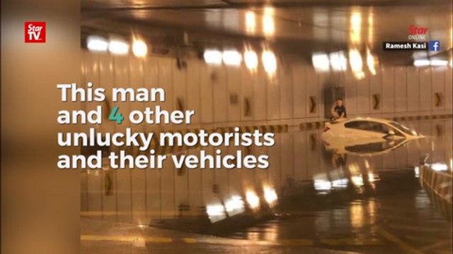 Motorists get stranded when flash flood hits tunnel