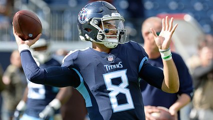 Mariota throws under pressure to diving Davis