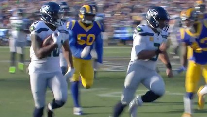 Wilson leads the way for Penny on 24-yard gain