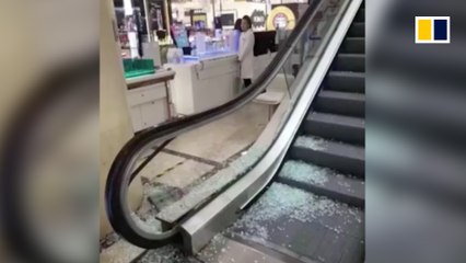 Chinese men rush to buy shoes, damaging escalator