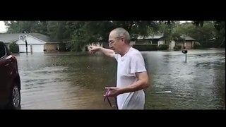 Old Man Sees Terrified Dog Trapped During Flood, Then He Does What Very Few People Would Do