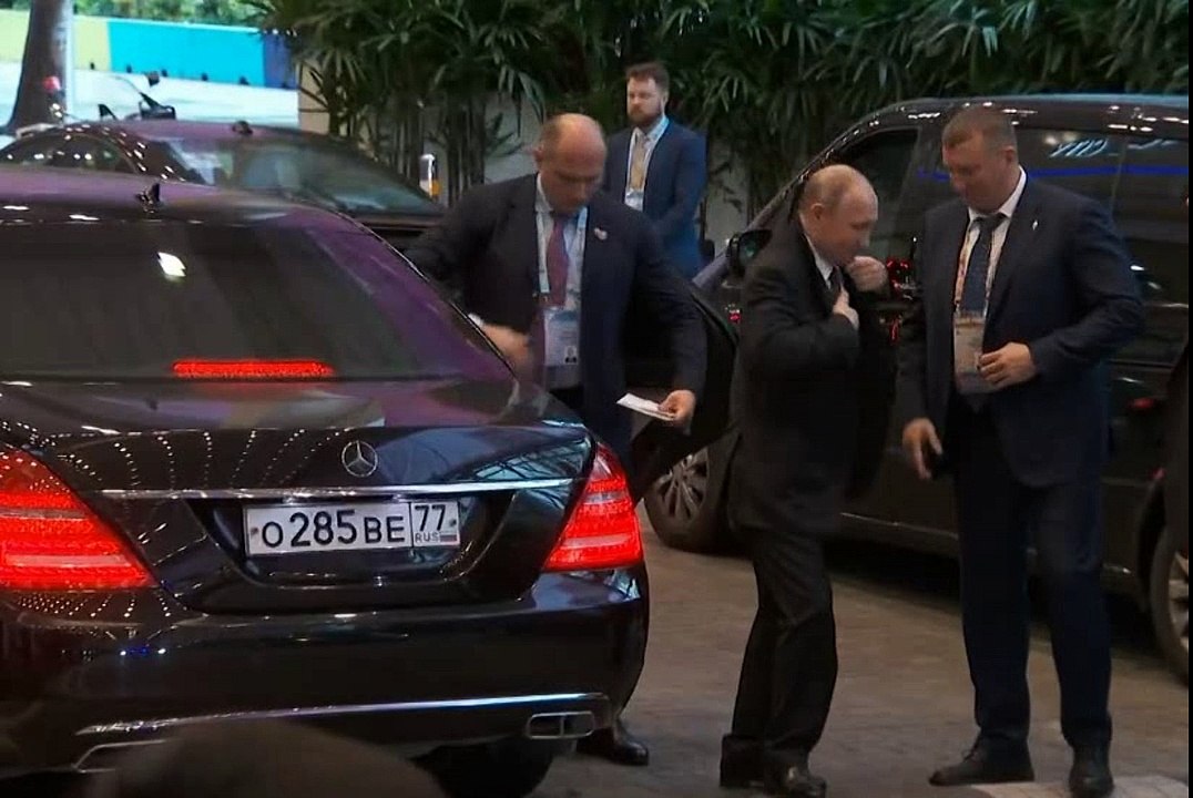 Putin in Singapore conducted through a metal detector. he is tired