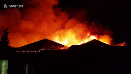 Large blaze tears through warehouse in Greater Manchester