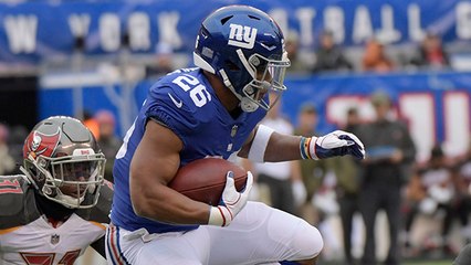 Saquon high steps down field for first down