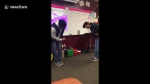 US teacher learns amazing secret handshakes for all his students