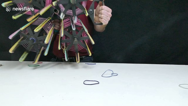YouTuber builds amazing quad-barrelled rubber-band machine gun