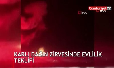 Karlı dağın zirvesinde evlilik teklifi