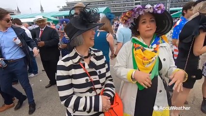 Adding some rain gear to the Kentucky Derby fashion