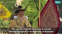 Newly-crowned Thai king carried in elaborate royal procession
