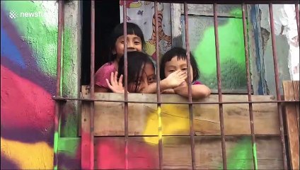 Artists cheer up red light district of Guatemala City with colourful creations